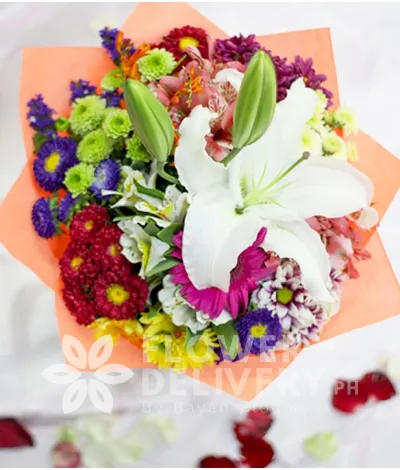 Casa Blanca with Mixed Colorful Flowers