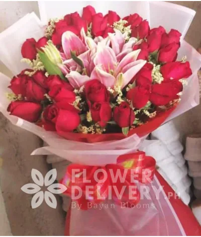 3 Dozen Imported Red Roses with Stargazers