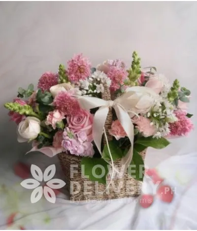 A Basket of Mixed Pink Flowers A Basket of Mixed Pink Flowers