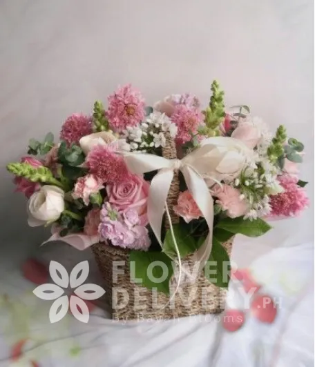 A Basket of Mixed Pink Flowers