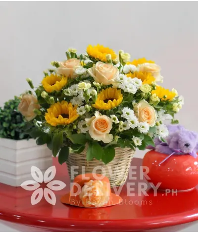 A Basket of Sunflowers and Roses A Basket of Sunflowers and Roses