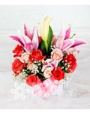 Charming Pink Flowers in a Round Box