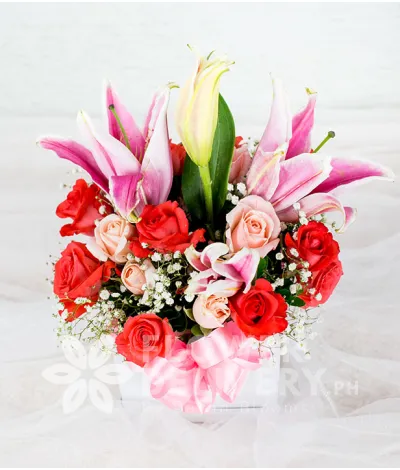 Charming Pink Flowers in a Round Box Charming Pink Flowers in a Round Box