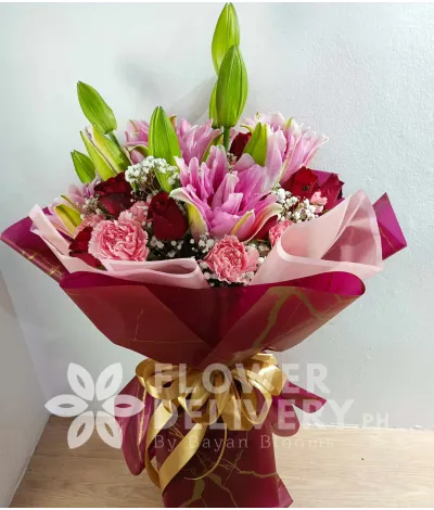 1 dozen pink carnation, 1 dozen red roses and 1 dozen stargazer in a bouquet 1 dozen pink carnation, 1 dozen red roses and 1 dozen stargazer in a bouquet