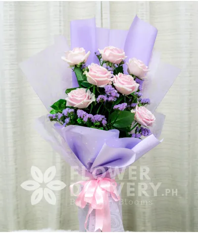 7 Stems Light Pink Imported Roses with Statice 7 Stems Light Pink Imported Roses with Statice
