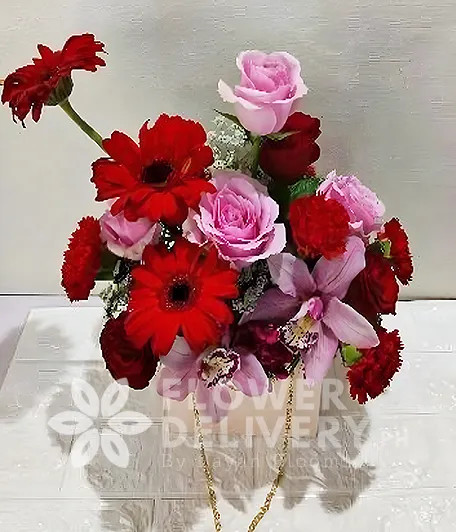 Vase of Roses with Gerberas
