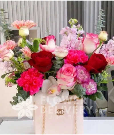 Mom’s Bag 2 Imported roses Gerbera Mathiolla Carnations Eucalyptus