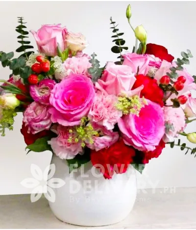 Special Arrangement of Imported Roses, Paper Roses, Carnations and Eucalyptus